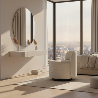 A modern cylindrical upholstered stool with a textured cream bouclé fabric and a black circular base, shown from a three-quarters angle against a solid off-white background.